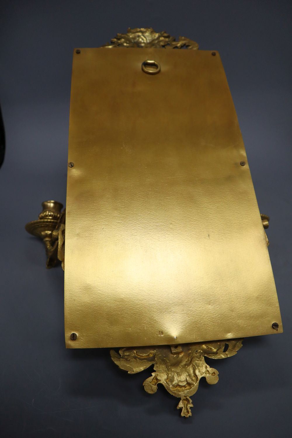 A Victorian cast brass two branch girandole, length 39cm